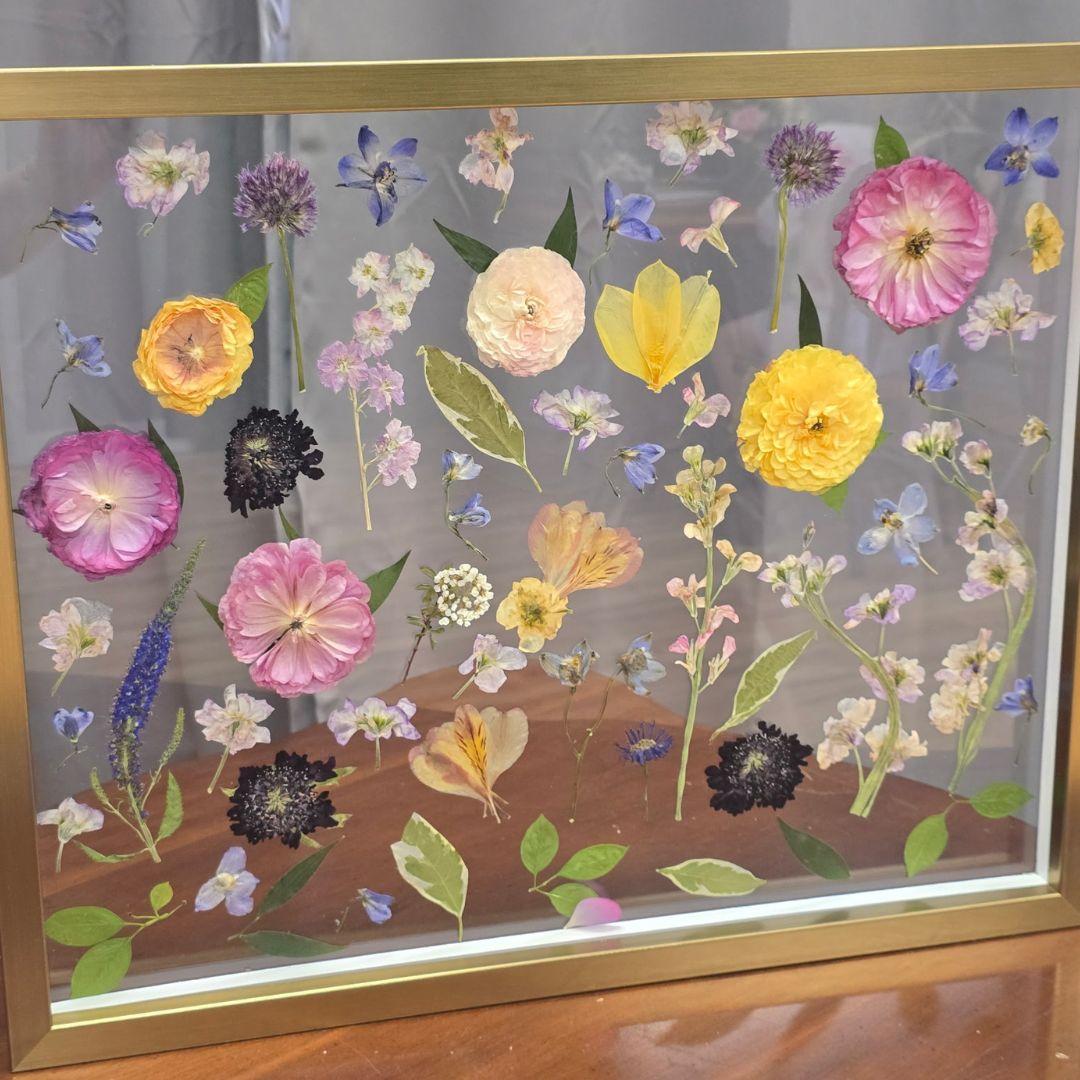 Hand crafted custom pressed wedding bouquet in elegant white frame Northern Colorado preservation