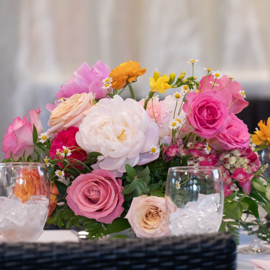 Colorful wedding reception centerpiece with peonies, roses, chamomile and ranunculus — The Joyful Poppy Fort Collins CO
